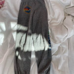 Gray Kids 12 Av sweatpants logo